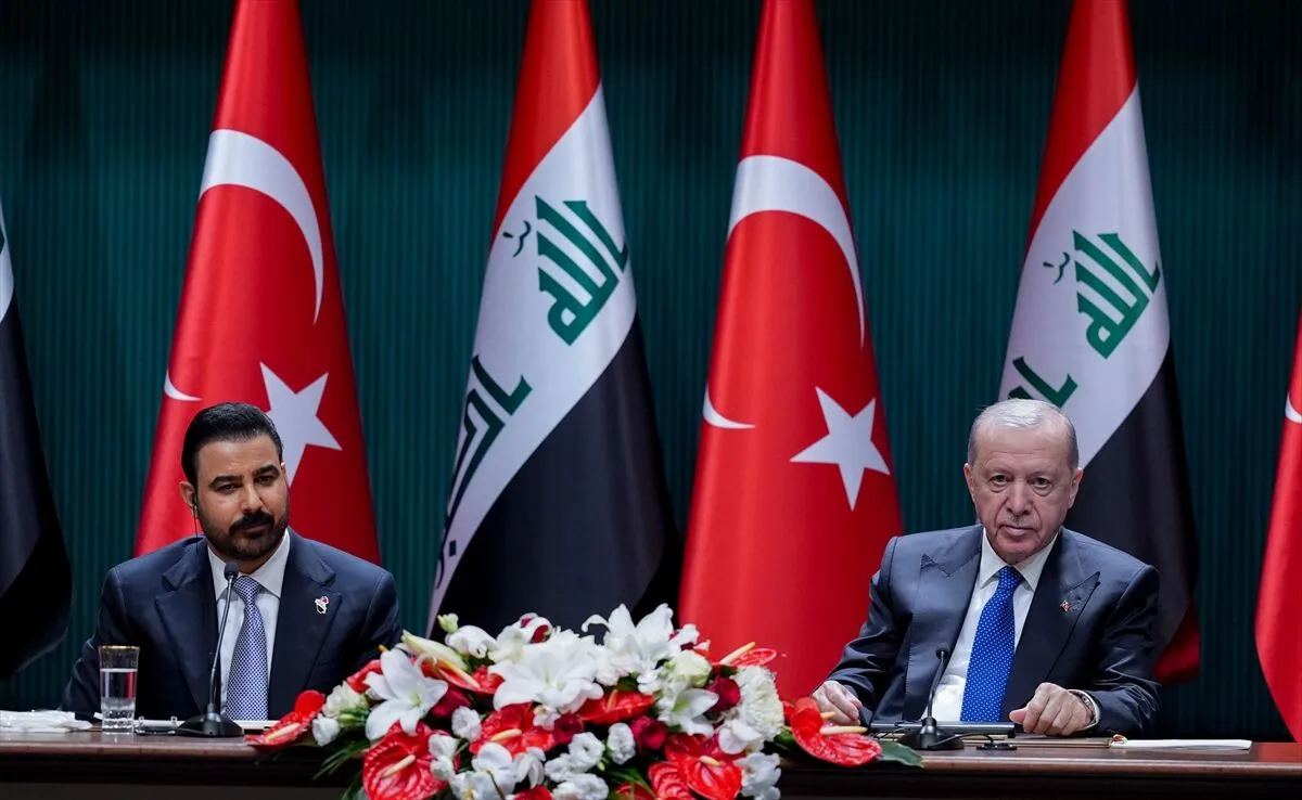 President Recep Tayyip Erdoğan and Iraqi Prime Minister Ali al-Zaidi seated at a long table during a joint news conference, with Turkish and Iraqi flags behind them.